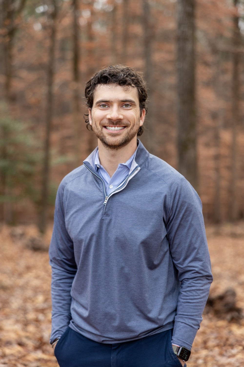 Stephen Albright, founder of Disability Driven, standing in a forest